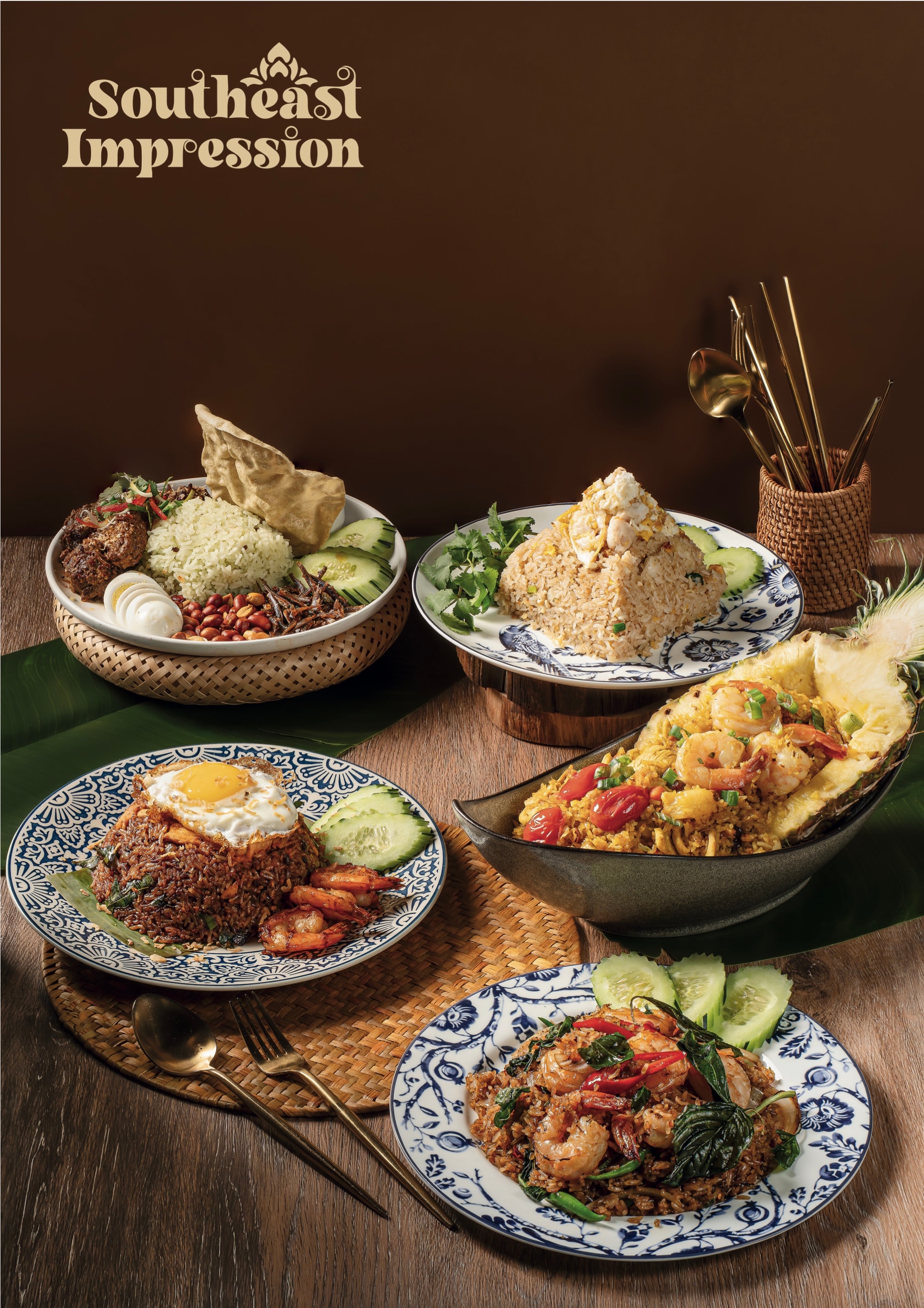 Nasi lemak with anchovy, boiled egg and sambal, and nasi goreng alongside